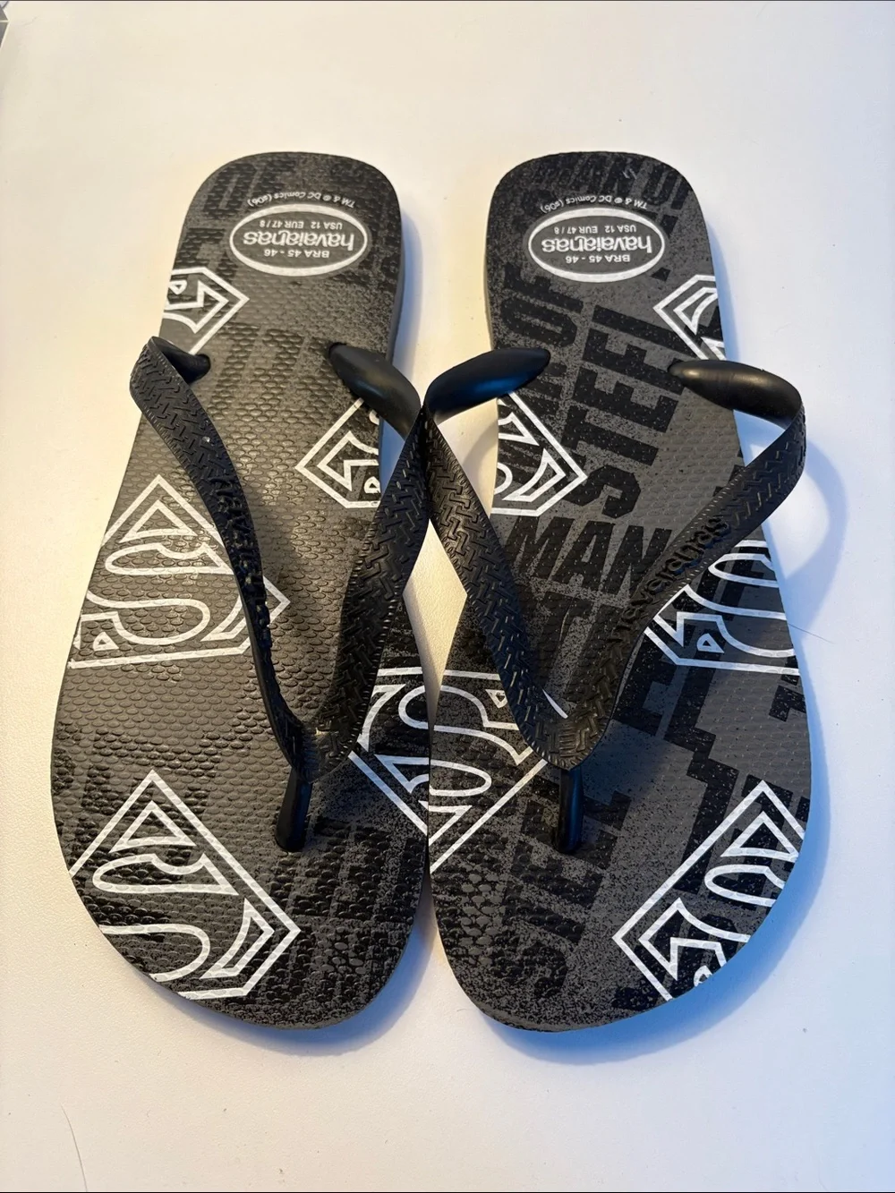 THREE pairs of men’s flip flops